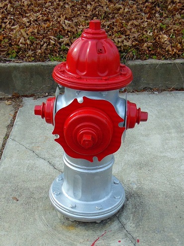 A class C red-top fire hydrant.