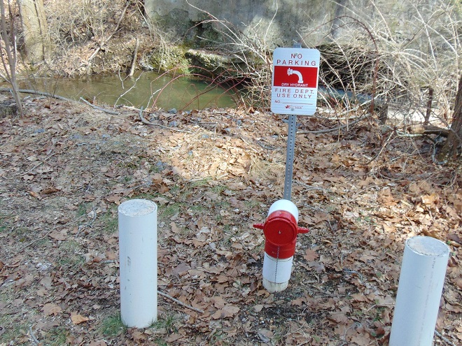 A dry hydrant installed to use water from a stream for rural firefighting.